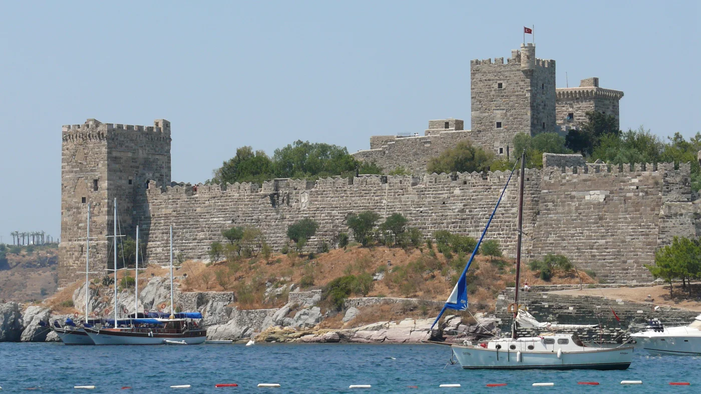 Bodrum Castle viewed across the water with sailing boats