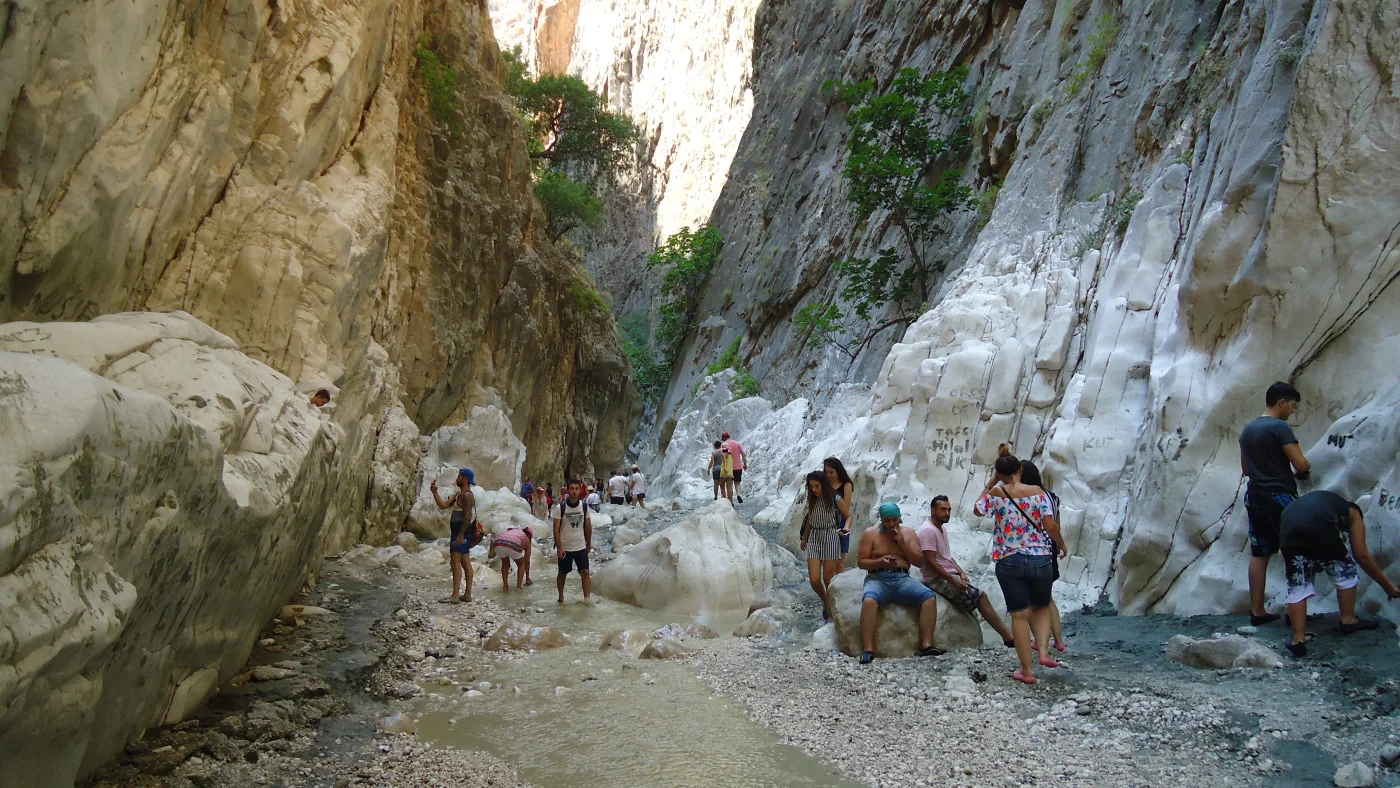 Visitors walking through Saklikent Canyon near Fethiye